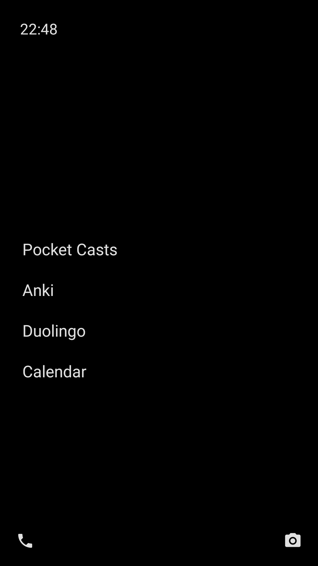 Home screen on my Android smartphone, showing the current time at the top as well as buttons for four apps: a podcasts app, a spaced repetition app, a language learning app, and a calendar app