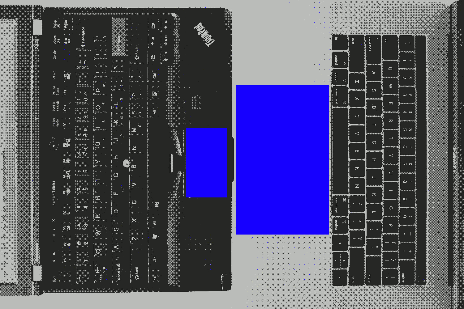 Comparison of trackpad size between Lenovo ThinkPad X220 and 15 inch MacBook Pro